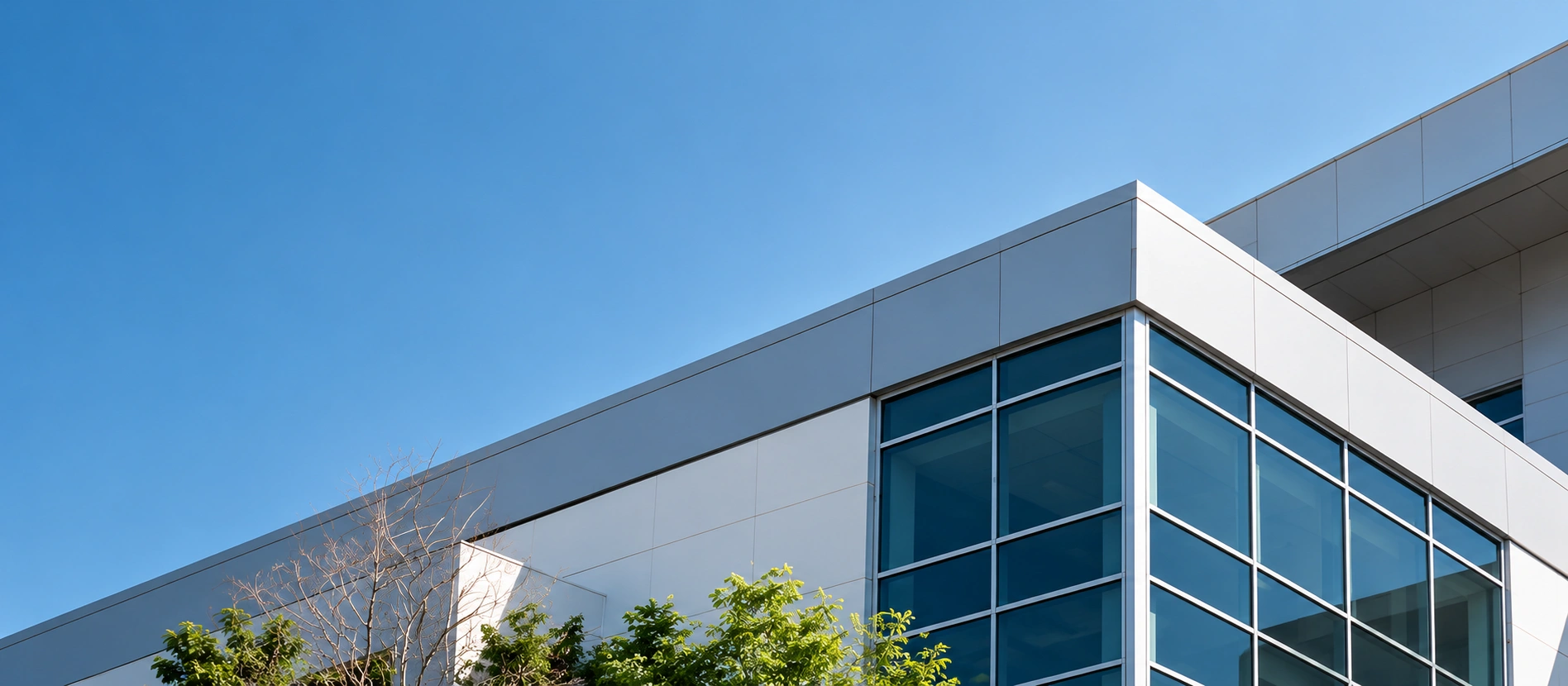CEEG headquarters building under a clear blue sky
